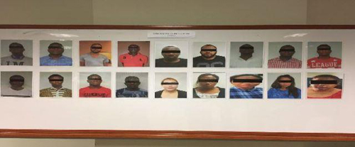 Suspects arrested in Malaysian love scam raids. (Photo by SPF)